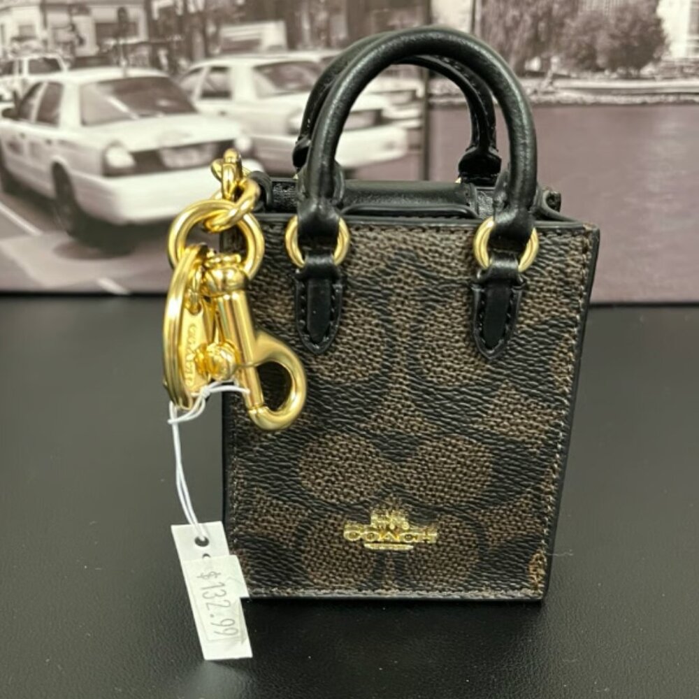 Coach signature N/S bag charm